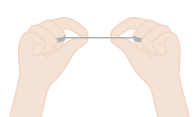 デンタルフロスを左右の中指に2～3回巻きつけて人差し指でフロスを張ります。